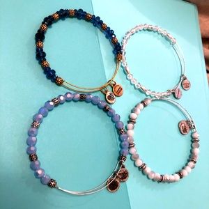 Four beaded Alex and Ani bracelets